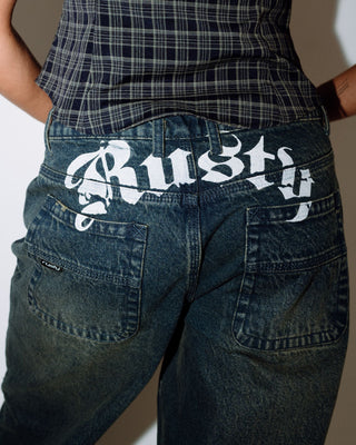 Woman wearing Roxanne Baggy Low Rise Jean in Dark N Dirty