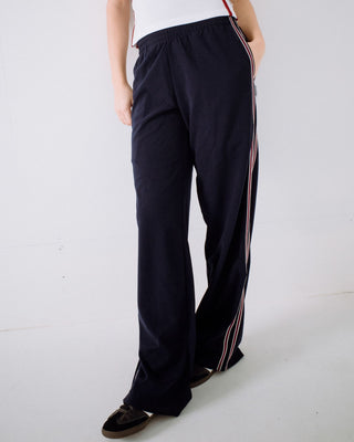 Woman wearing Brother Bronson Lounge Pant in Navy Blue