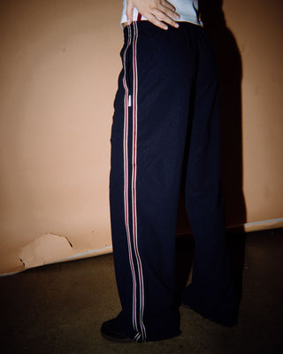 Woman wearing Brother Bronson Lounge Pant in Navy Blue