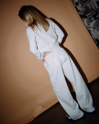 Woman wearing Trailer Trash Wide Leg Track Pant in Ecru Marle