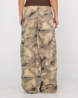 Woman wearing Camoozy Low Rise Cargo Pant in Camo