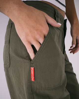 Woman wearing Ultra Cargo Low Rise Wide Pant in Army Green