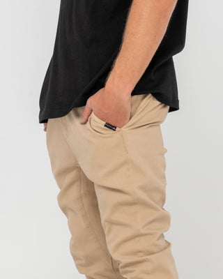 Man wearing Hook Out Elastic Pant in Khaki