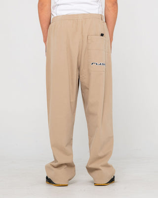 Man wearing Flip Daddy Elastic Pant in Abbey Stone