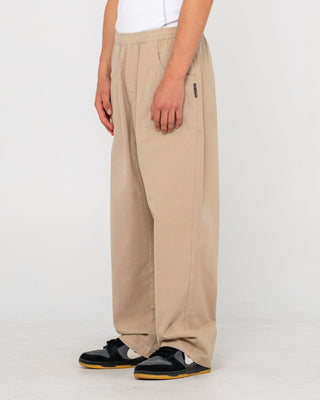 Man wearing Flip Daddy Elastic Pant in Abbey Stone