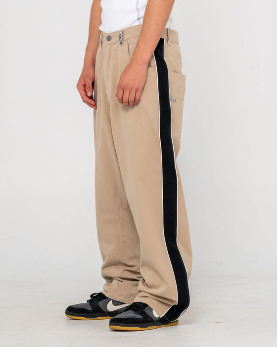 man-wearing-flip-daddy-taped-pant-in-abbey-stone