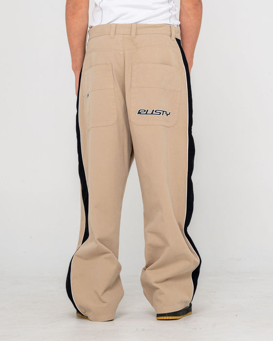 man-wearing-flip-daddy-taped-pant-in-abbey-stone