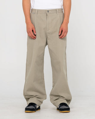 Man wearing Request Line Herringbone Pant in Abbey Stone