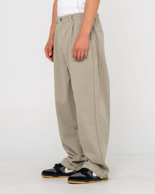 Man wearing Request Line Herringbone Pant in Abbey Stone