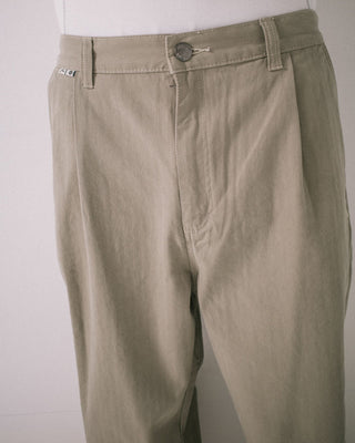 Man wearing Request Line Herringbone Pant in Abbey Stone