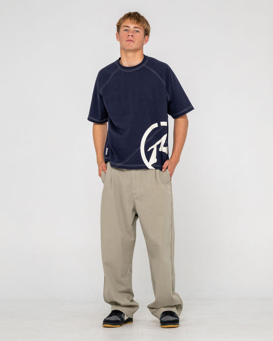 man-wearing-request-line-herringbone-pant-in-abbey-stone