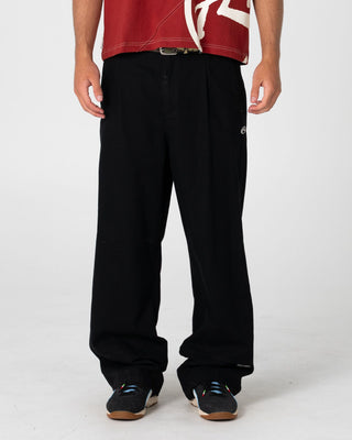 Man wearing Shindawg Pleated Baggy Pant in Black