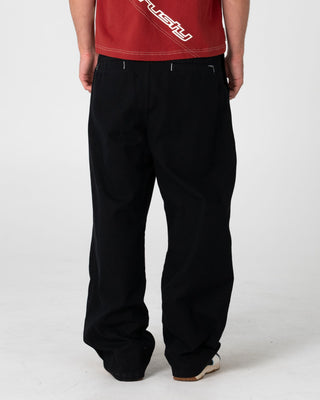 Man wearing Shindawg Pleated Baggy Pant in Black
