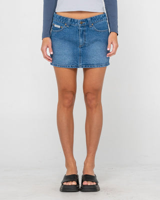 Woman wearing Mavericks Low Rise Denim Mini Skirt in Blasted Middy Blue