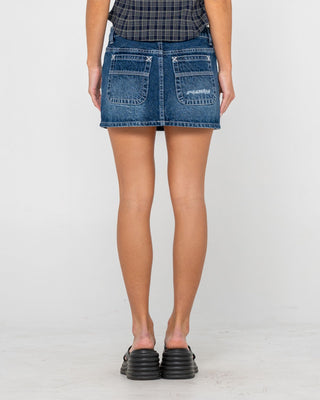 Woman wearing Flip Mommy DIY Low Rise Mini Denim Skirt in Blasted Deep Sea Blue