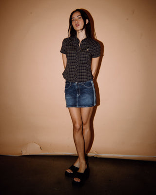 Woman wearing Flip Mommy DIY Low Rise Mini Denim Skirt in Blasted Deep Sea Blue