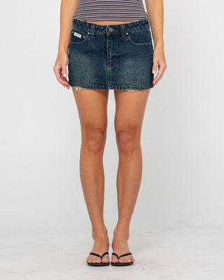 Woman wearing Roxanne Low Rise Denim Micro Mini Skirt in Dark N Dirty