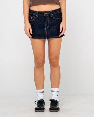 Woman wearing Tripper Raw Low Rise Denim Micro Skirt in Raw Dawg Blue