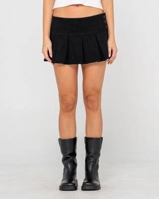 Woman wearing Bahdnani Low Rise Pleated Skirt in Black