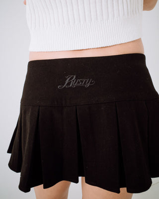 Woman wearing Bahdnani Low Rise Pleated Skirt in Black
