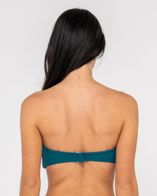 Woman wearing Sandalwood Bandeau Twist Bikini Top in Deep Teal