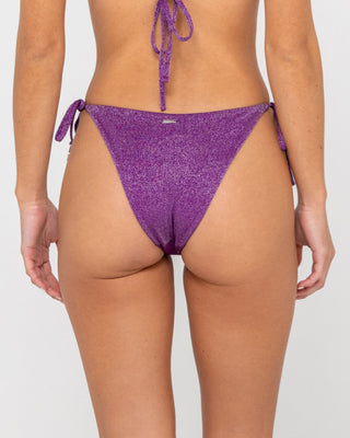 Woman wearing Shimmy Midi Side Ties Bikini Bottom in Grape