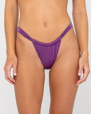 Woman wearing Shimmy String Bikini Bottom in Grape