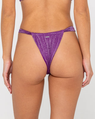Woman wearing Shimmy String Bikini Bottom in Grape