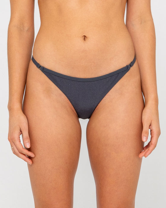 woman-wearing-shadow-ring-cheeky-bikini-bottom-in-carbon