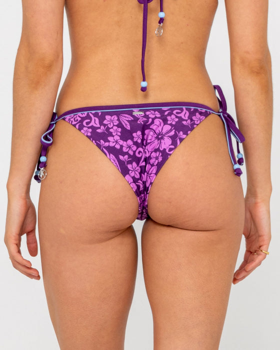woman-wearing-carbina-midi-side-ties-bikini-bottom-in-grape