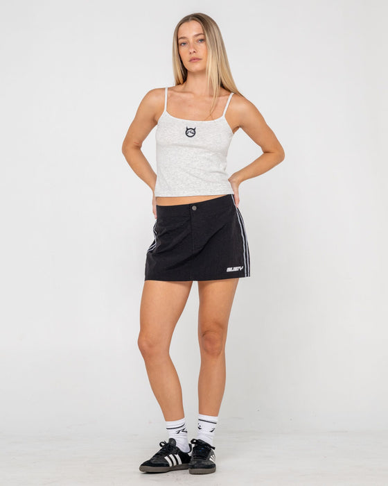 woman-wearing-core-circle-horn-tank-in-ecru-marle