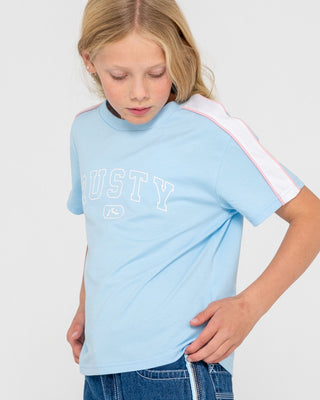 Girl wearing Girls Team Varity Standard Tee in Vintage Blue