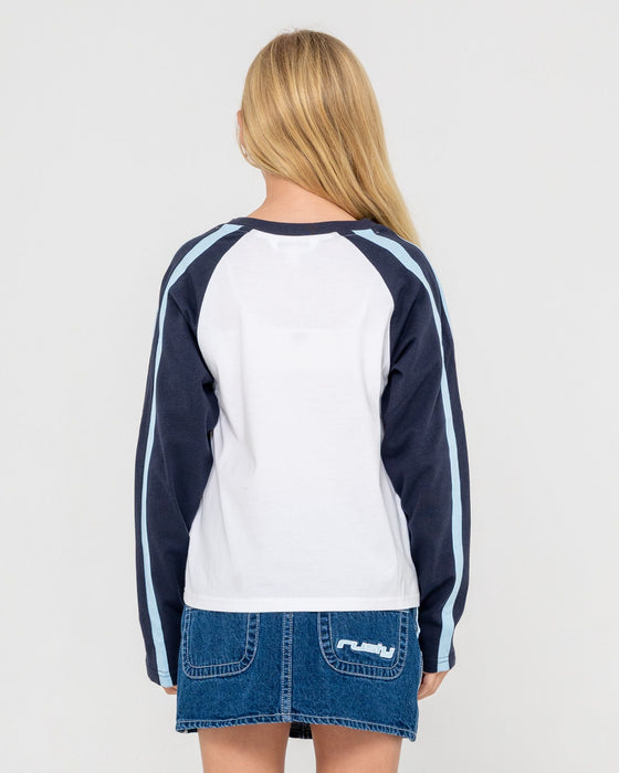 girl-wearing-sporty-r-raglan-ls-girls-tee-in-navy-white