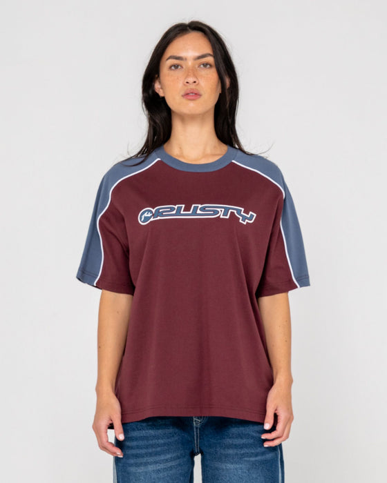 woman-wearing-timmy-target-oversize-tee-in-cranberry