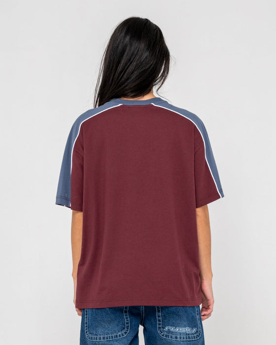 woman-wearing-timmy-target-oversize-tee-in-cranberry