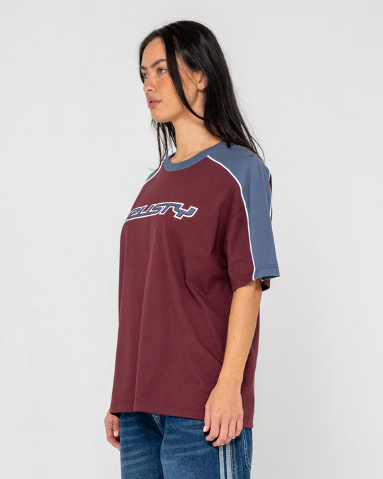 woman-wearing-timmy-target-oversize-tee-in-cranberry