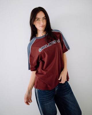 Woman wearing Timmy Target Oversize Tee in Cranberry