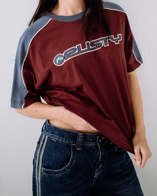 Woman wearing Timmy Target Oversize Tee in Cranberry