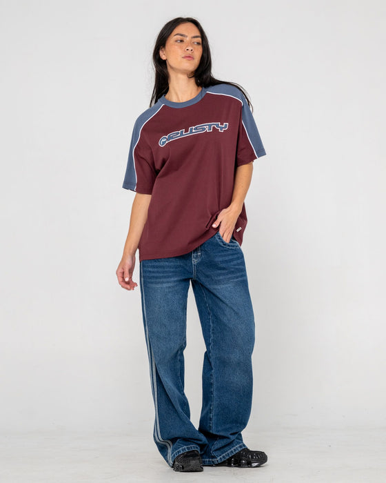 woman-wearing-timmy-target-oversize-tee-in-cranberry