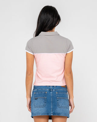 Woman wearing Insert Dad Joke Baby Polo Tee in Pink / Grey
