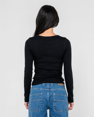 Woman wearing Rusty Essentials L/S Sleeve Fitted Tee in Black