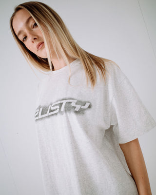 Woman wearing Sprayer Oversize Tee in Ecru Marle