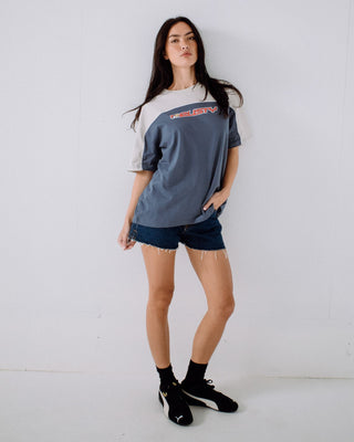 Woman wearing Archived Ops Oversize Short Sleeve Tee in China Blue