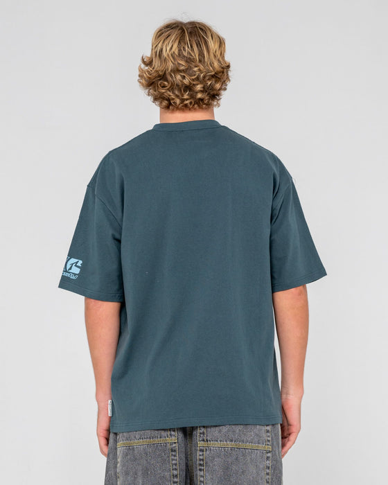 man-wearing-jetsetter-short-sleeve-tee-in-deep-teal