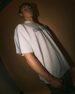 Man wearing Alonso Short Sleeve Tee in Cream