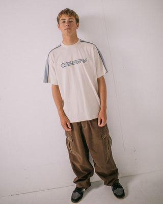 Man wearing Alonso Short Sleeve Tee in Cream