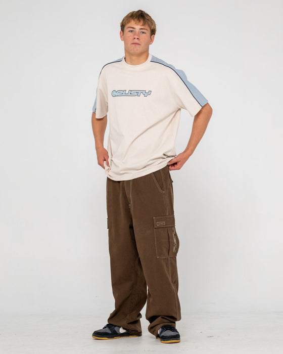 man-wearing-alonso-short-sleeve-tee-in-cream