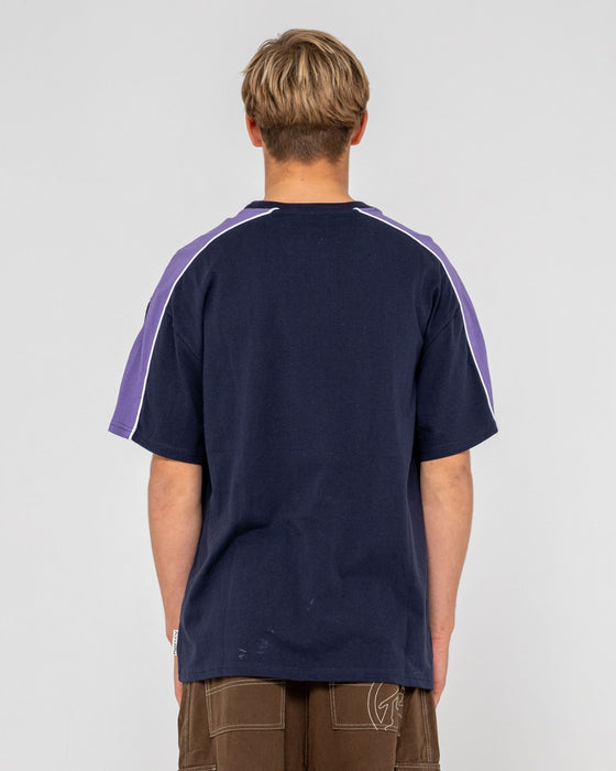 man-wearing-alonso-short-sleeve-tee-in-navy-blue-3