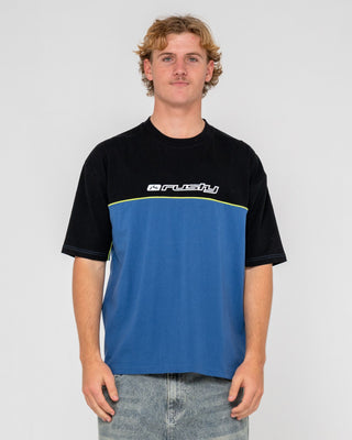Man wearing Infinity Short Sleeve Tee in Atlantic Blue