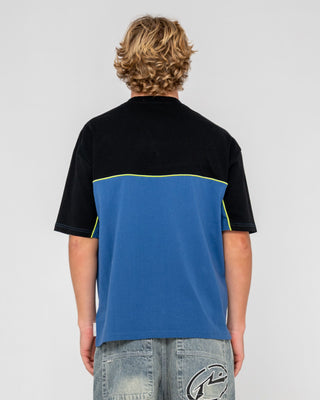 Man wearing Infinity Short Sleeve Tee in Atlantic Blue